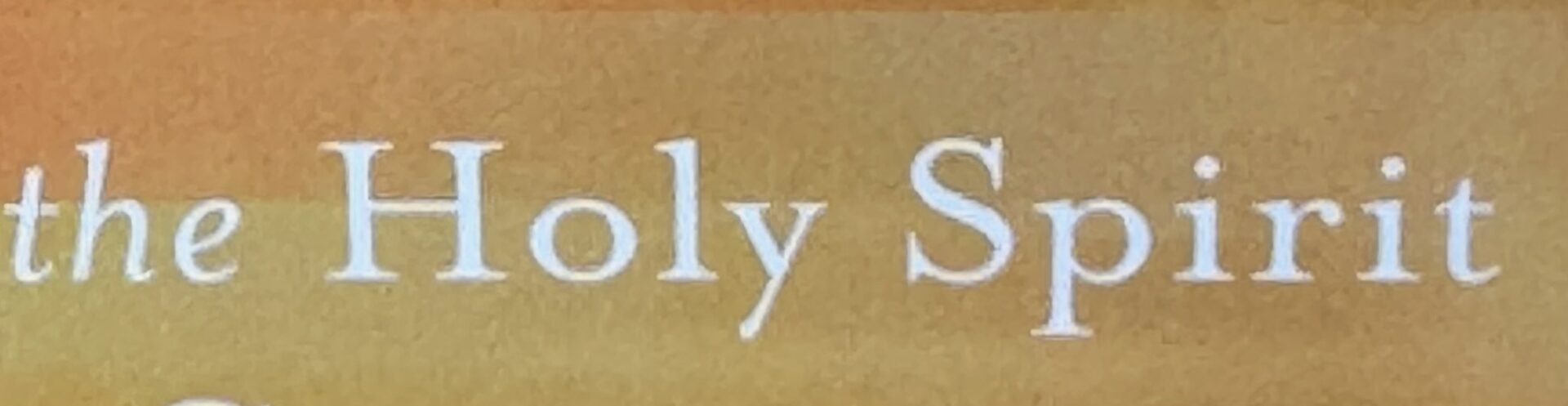 Gold background with "the Holy Spirit" text