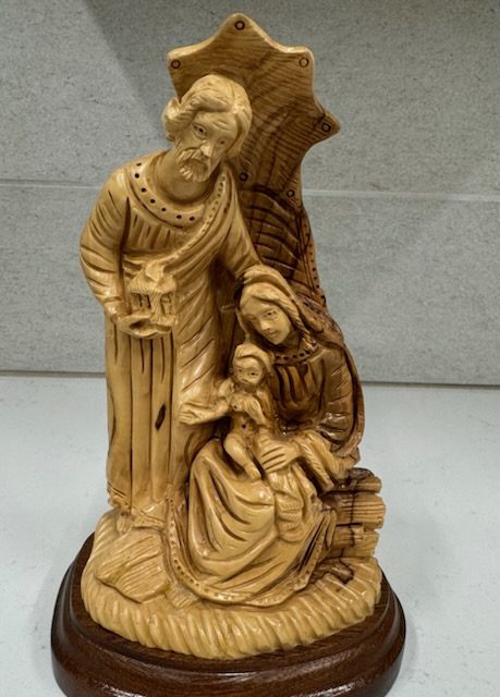 Carved nativity figurine of Mary, Joseph, Jesus