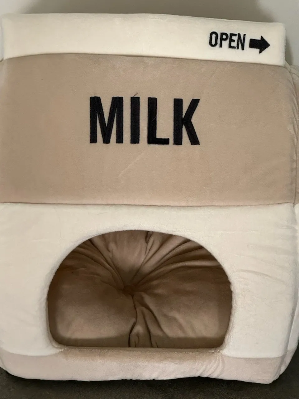 Beige plush milk carton cat bed